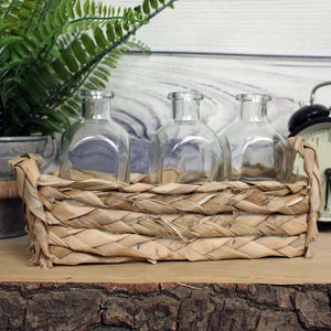 Straw Basket With Three Glass Bottles