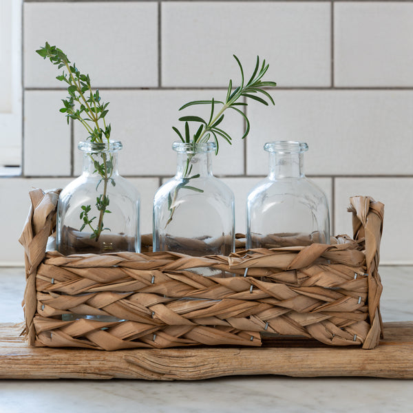 Straw Basket With Three Glass Bottles